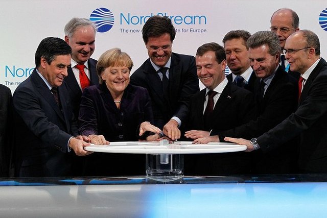 Nov. 2011: Nord Stream opening ceremony (left to right, hands on table) France's Francois Fillon; Germany's Angela Merkel; Holland's Mark Rutte and Russia's Dmitry Medvedev